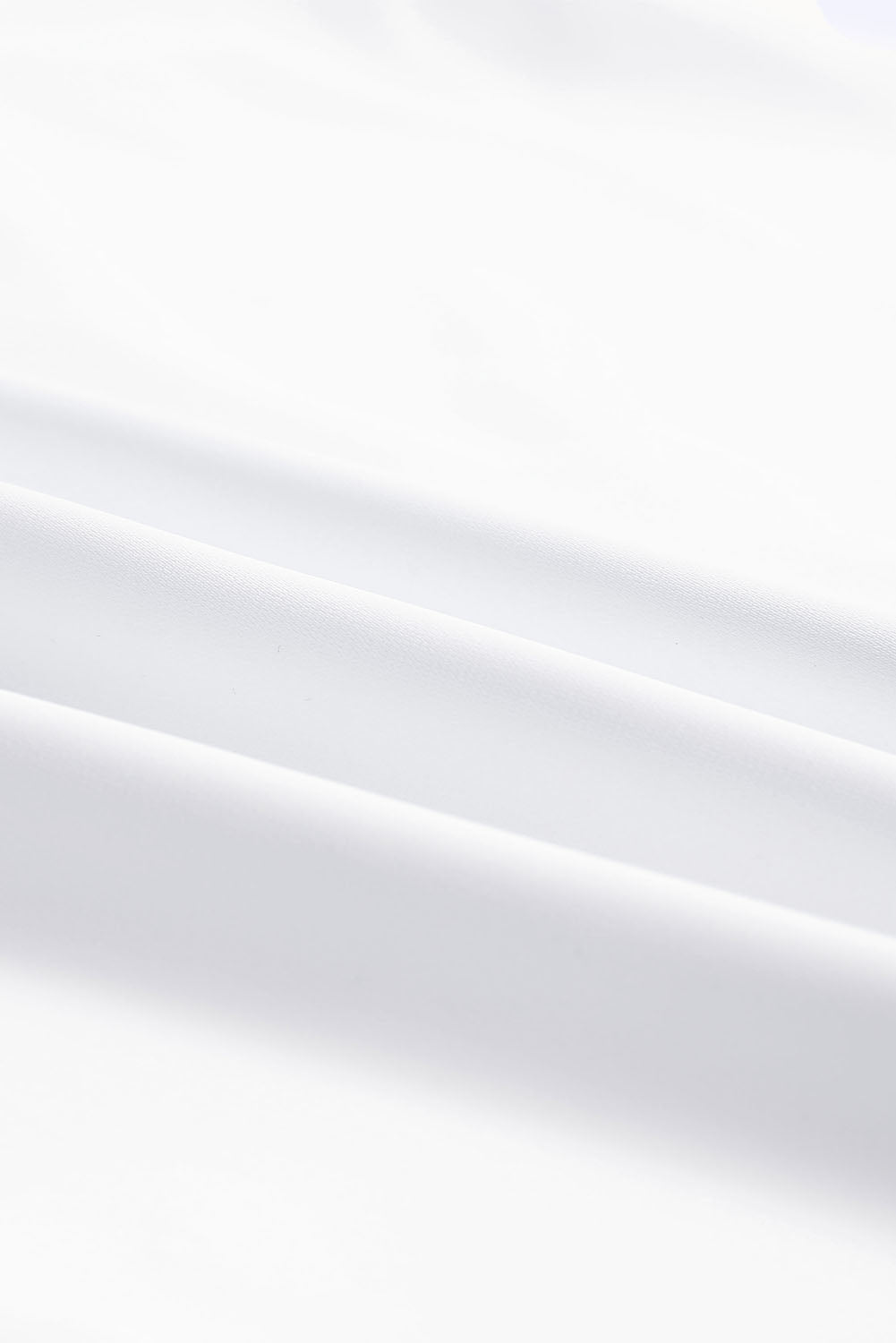 Blusa con cuello en V y media manga de color liso