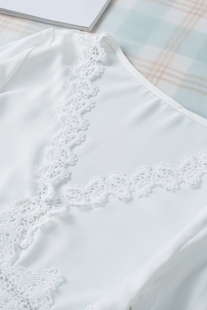 Chemisier à manches cloche et empiècements en crochet