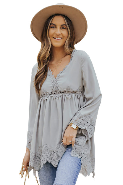 Chemisier à manches cloche et empiècements en crochet