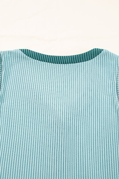 Débardeur texturé vert menthe à boutons et col en V contrasté