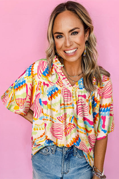 Chemisier orange à manches courtes et col en V, imprimé abstrait