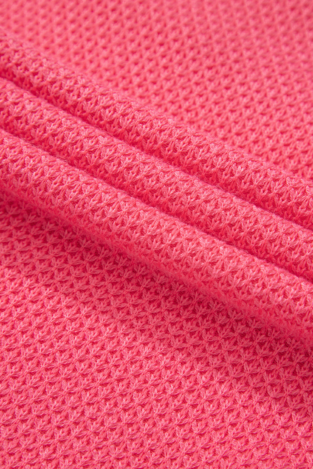 Veste-chemise ample boutonnée en tricot gaufré contrasté bicolore à motif fleur de pêcher