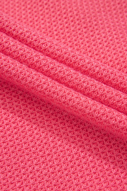 Veste-chemise ample boutonnée en tricot gaufré contrasté bicolore à motif fleur de pêcher