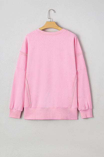 Pink Bow Sequin XOXO Letter Graphic Exposed Seam Baggy Sweatshirt