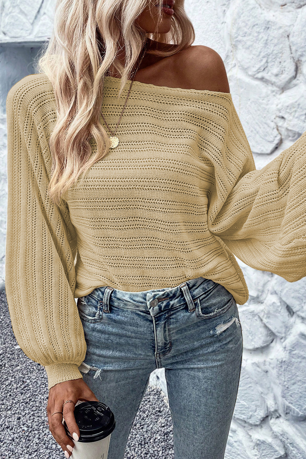 Suéter de punto texturizado con ojales y mangas farol albaricoque