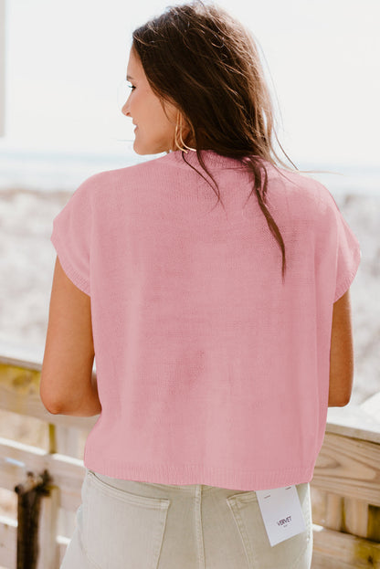 Pull à manches courtes en tricot rose à fleurs multicolores au crochet