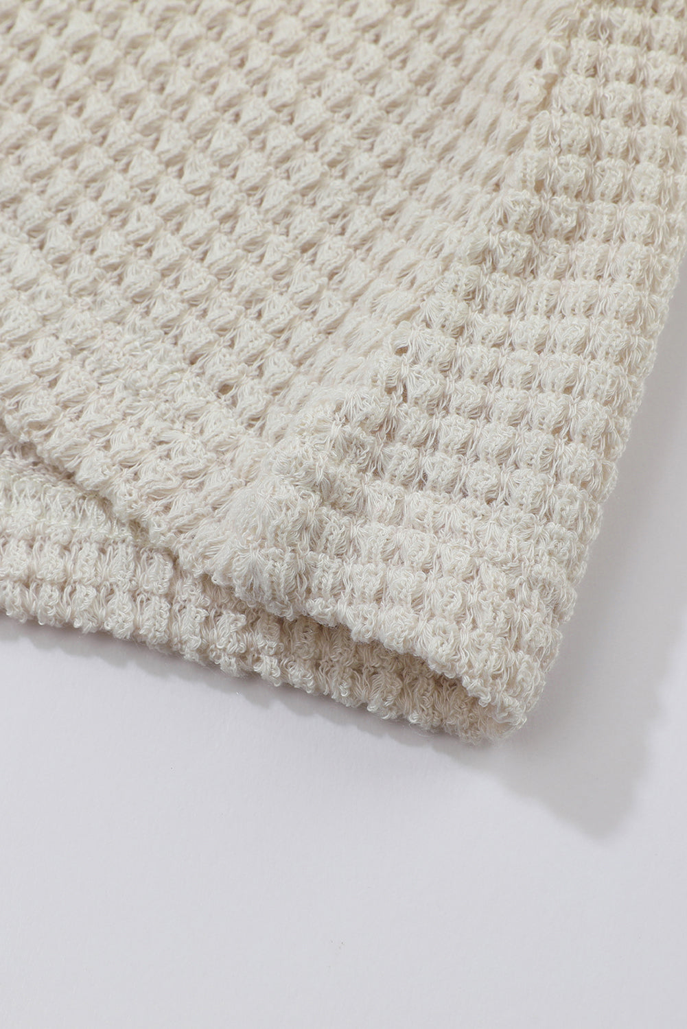 Haut en maille gaufrée beige à manches bouffantes et imprimé tournesol 