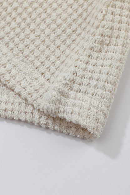 Haut en maille gaufrée beige à manches bouffantes et imprimé tournesol 