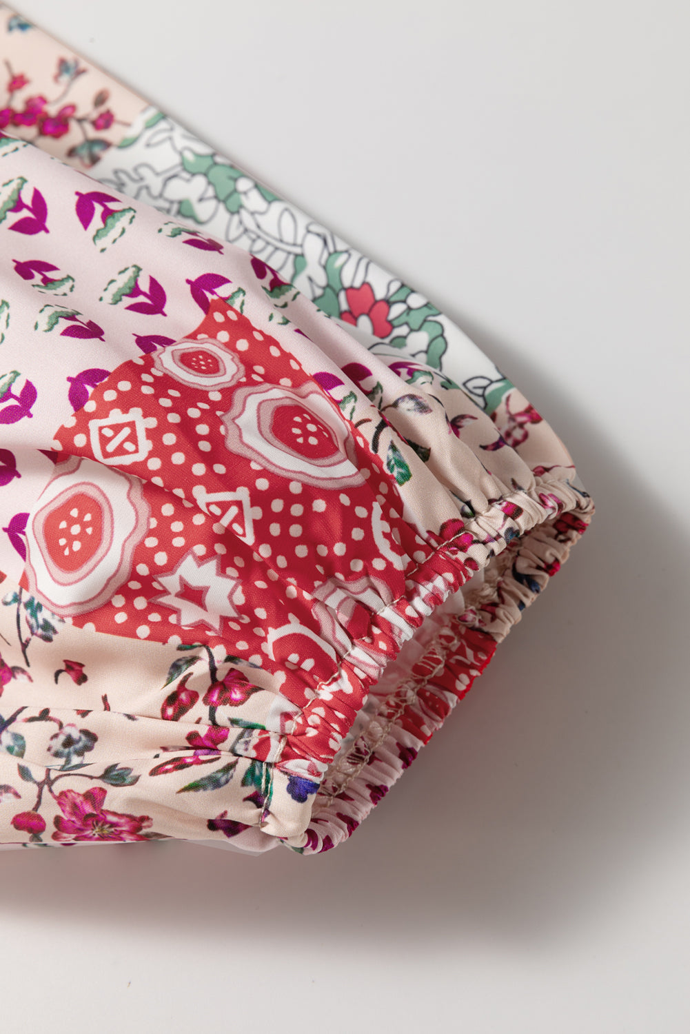 Chemisier orange à manches longues et col en V noué à imprimé floral mixte