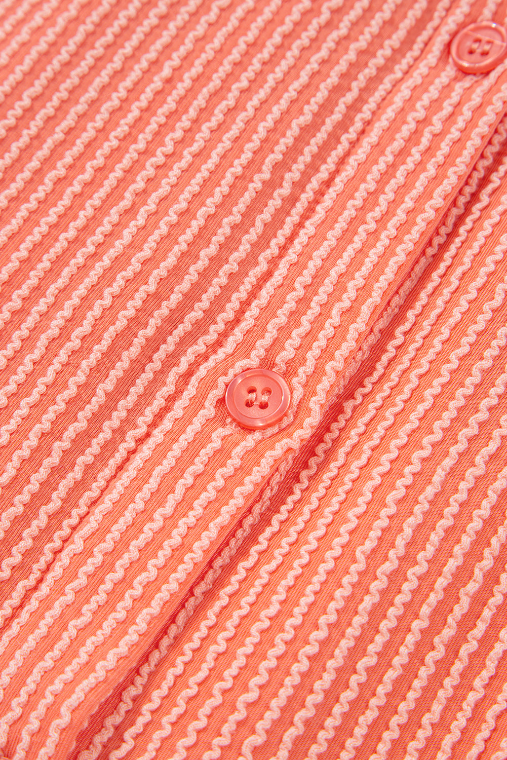 Chemise ample à manches mi-longues et ourlet haut-bas boutonné, couleur pamplemousse orange