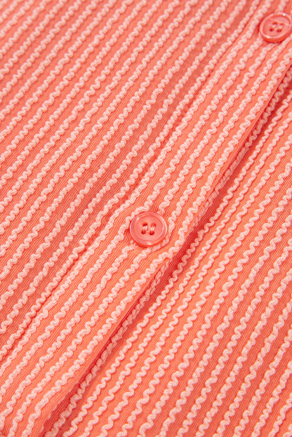 Chemise ample à manches mi-longues et ourlet haut-bas boutonné, couleur pamplemousse orange