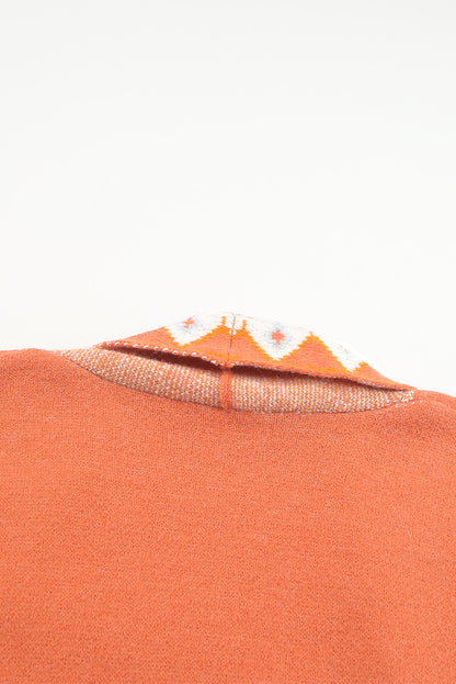 Cardigan ouvert en maille orange à imprimé aztèque