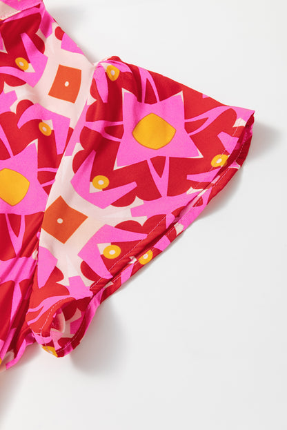 Robe longue à col en V et imprimé géométrique rose fraise