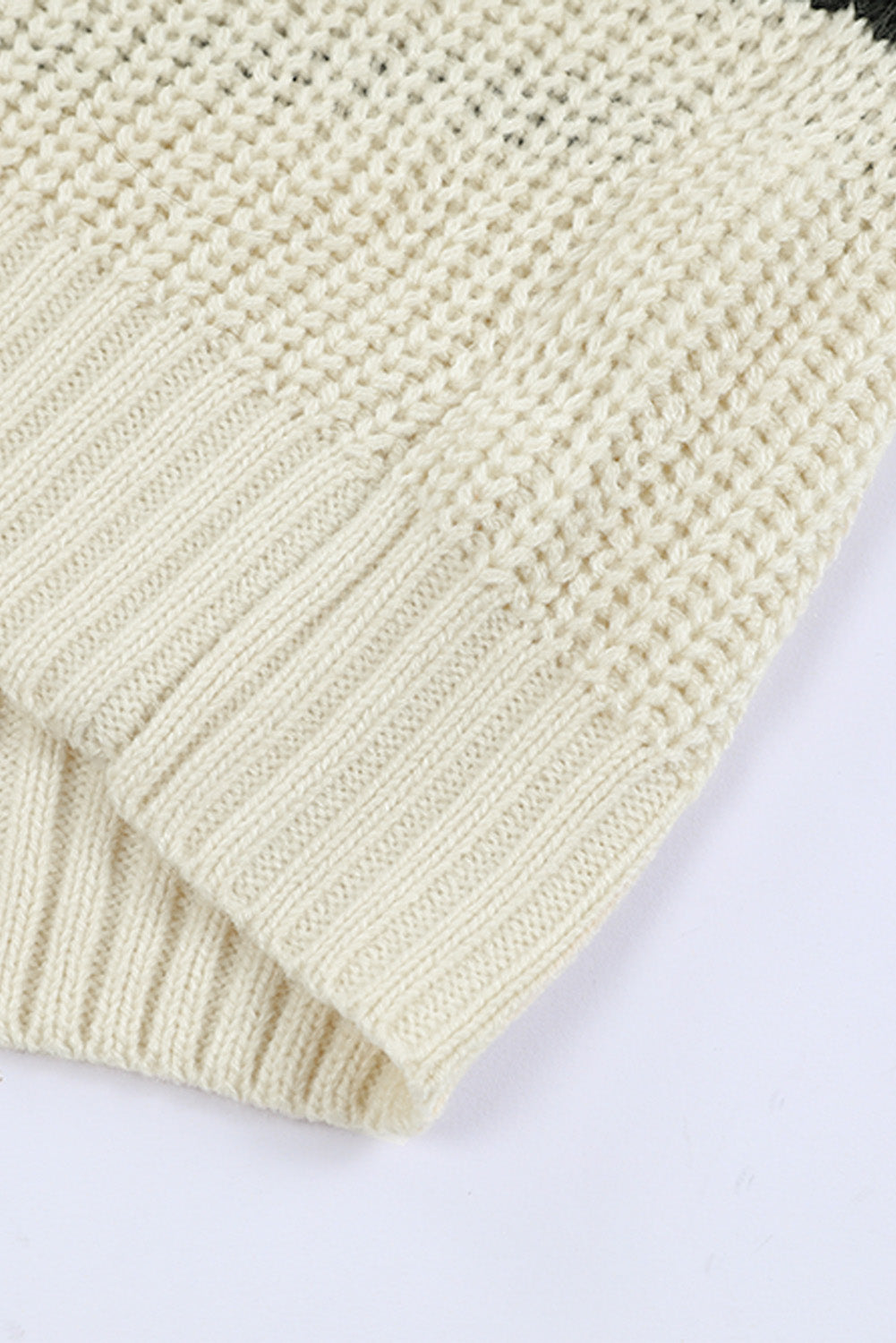 Pull en tricot rayé à épaules dénudées 