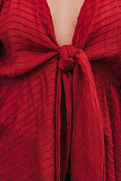 Chemisier péplum texturé noué sur le devant 