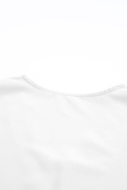 Chemisier à manches courtes et col en V avec bordure en dentelle