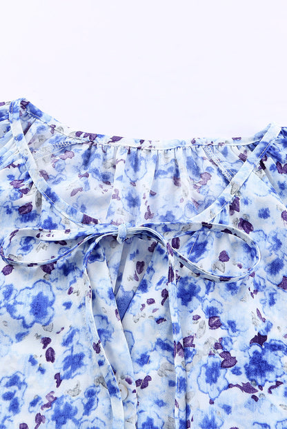 Blusa con botones y cuello en V con estampado floral 