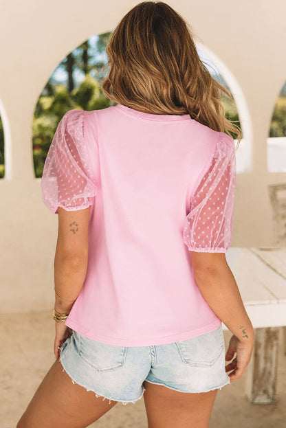 T-shirt à manches bouffantes en maille à pois brodée avec nœud papillon rose