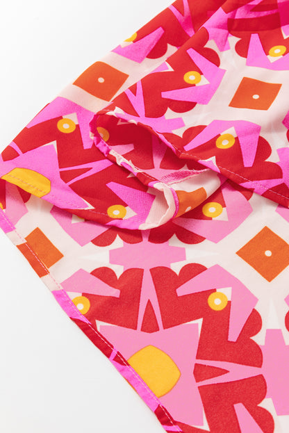 Robe longue à col en V et imprimé géométrique rose fraise