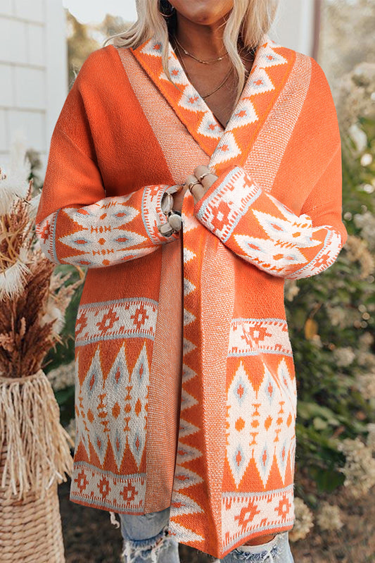 Cardigan ouvert en maille orange à imprimé aztèque
