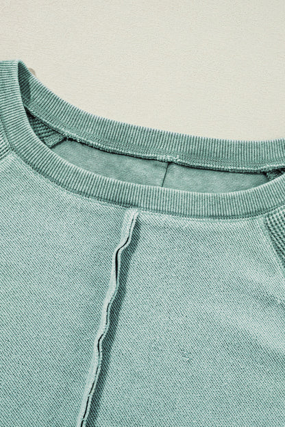 Sweat-shirt raglan bleu minéral en maille gaufrée à coutures apparentes