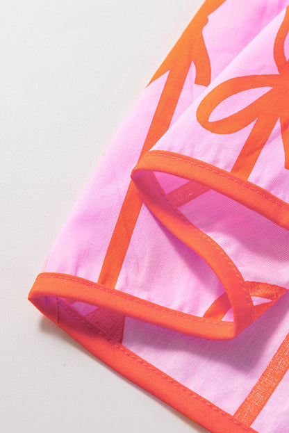 Robe grande taille à volants et taille cintrée avec nœud rose