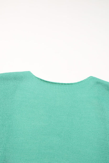 Cardigan ouvert à pompons marron et blocs de couleurs 