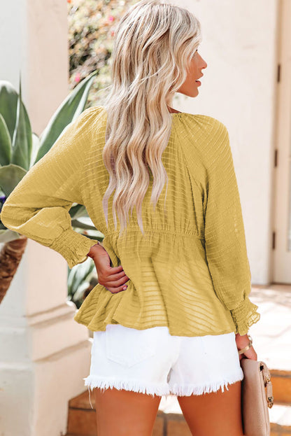 Chemisier péplum texturé noué sur le devant 