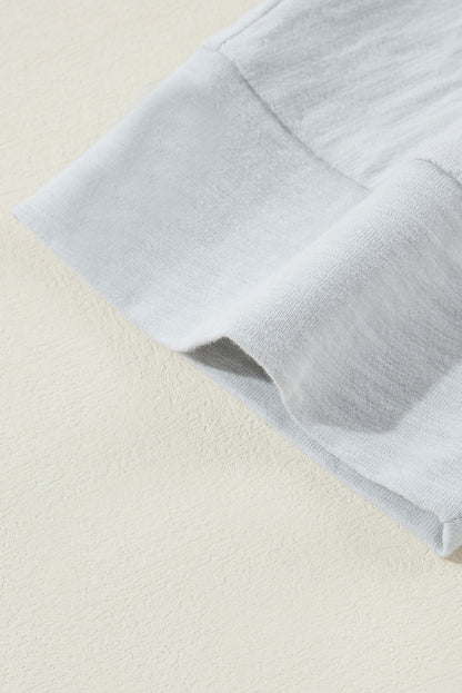 Haut haut bas vert grande taille à fleurs et coutures apparentes