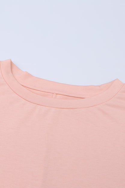 Tunique à manches courtes avec poches latérales 