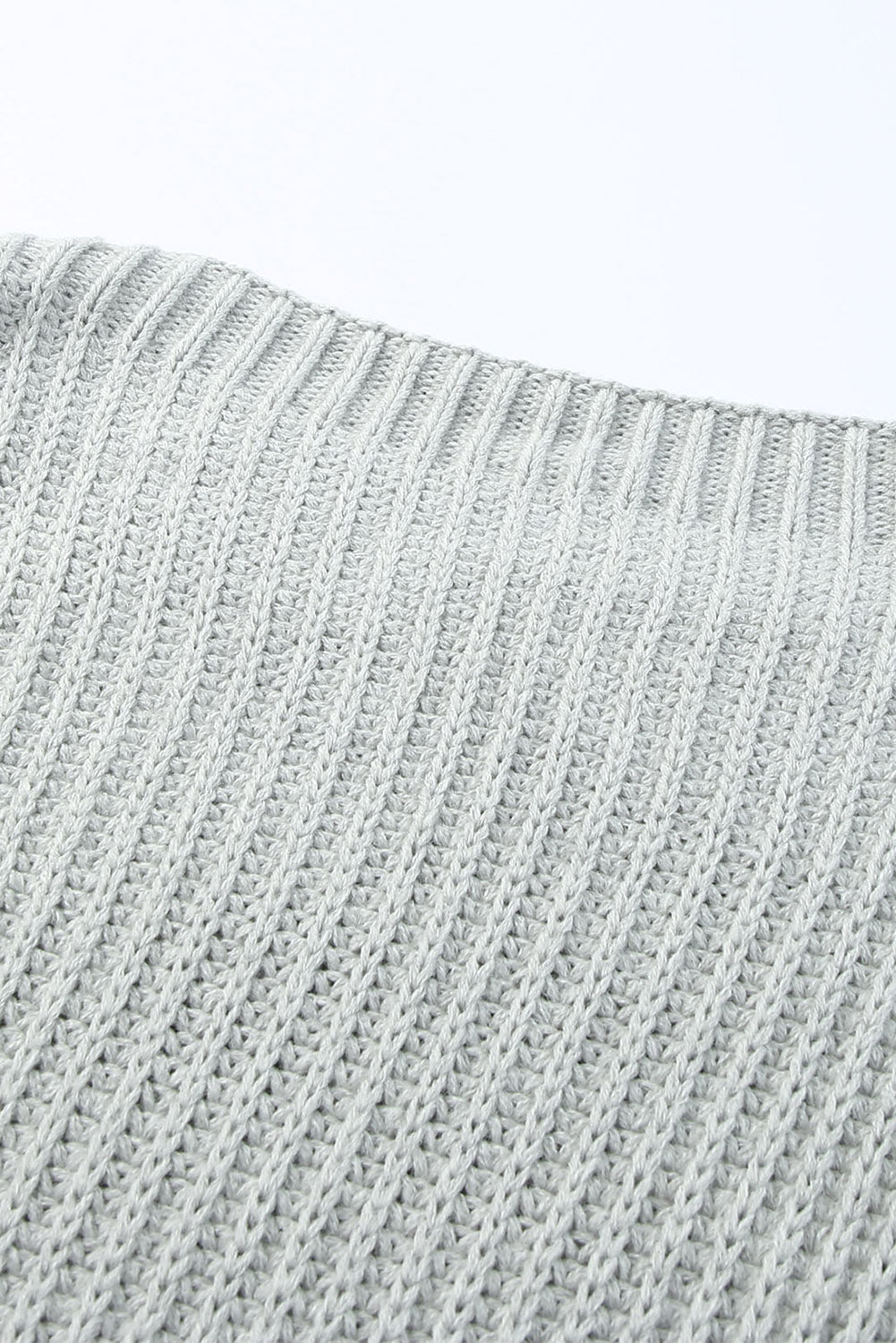 Pull oversize boutonné à épaules tombantes 