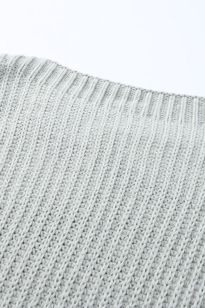 Pull oversize boutonné à épaules tombantes 