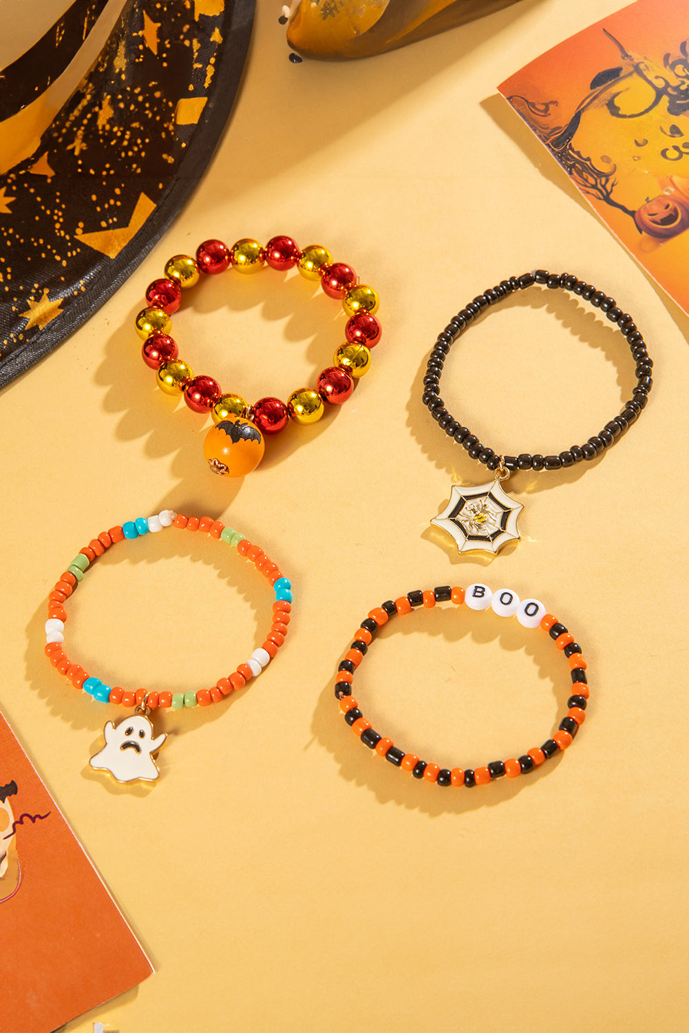 Ensemble de 4 bracelets orange en perles avec toile d'araignée fantôme d'Halloween