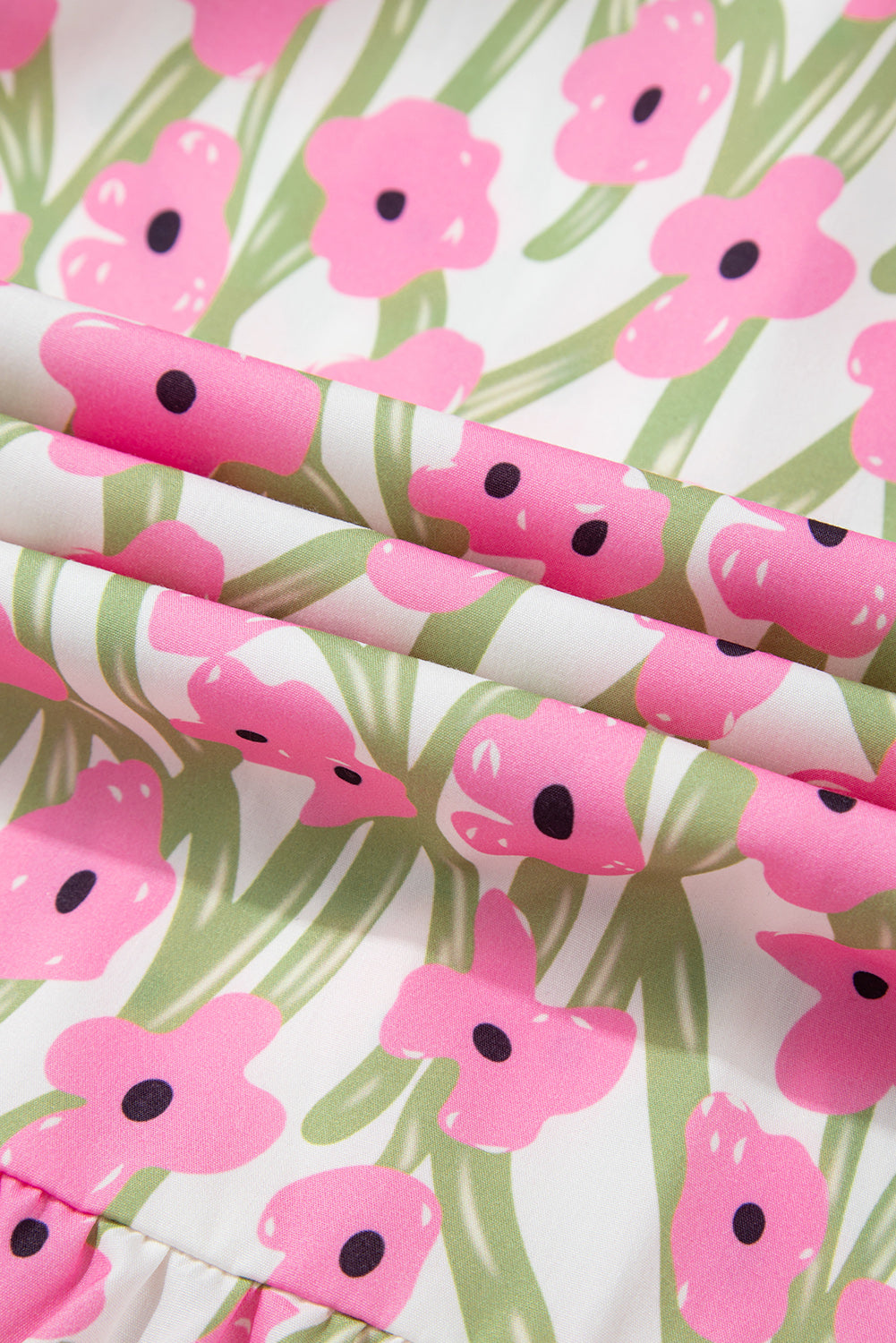 Robe longue rose à imprimé floral, col carré et bretelles à volants