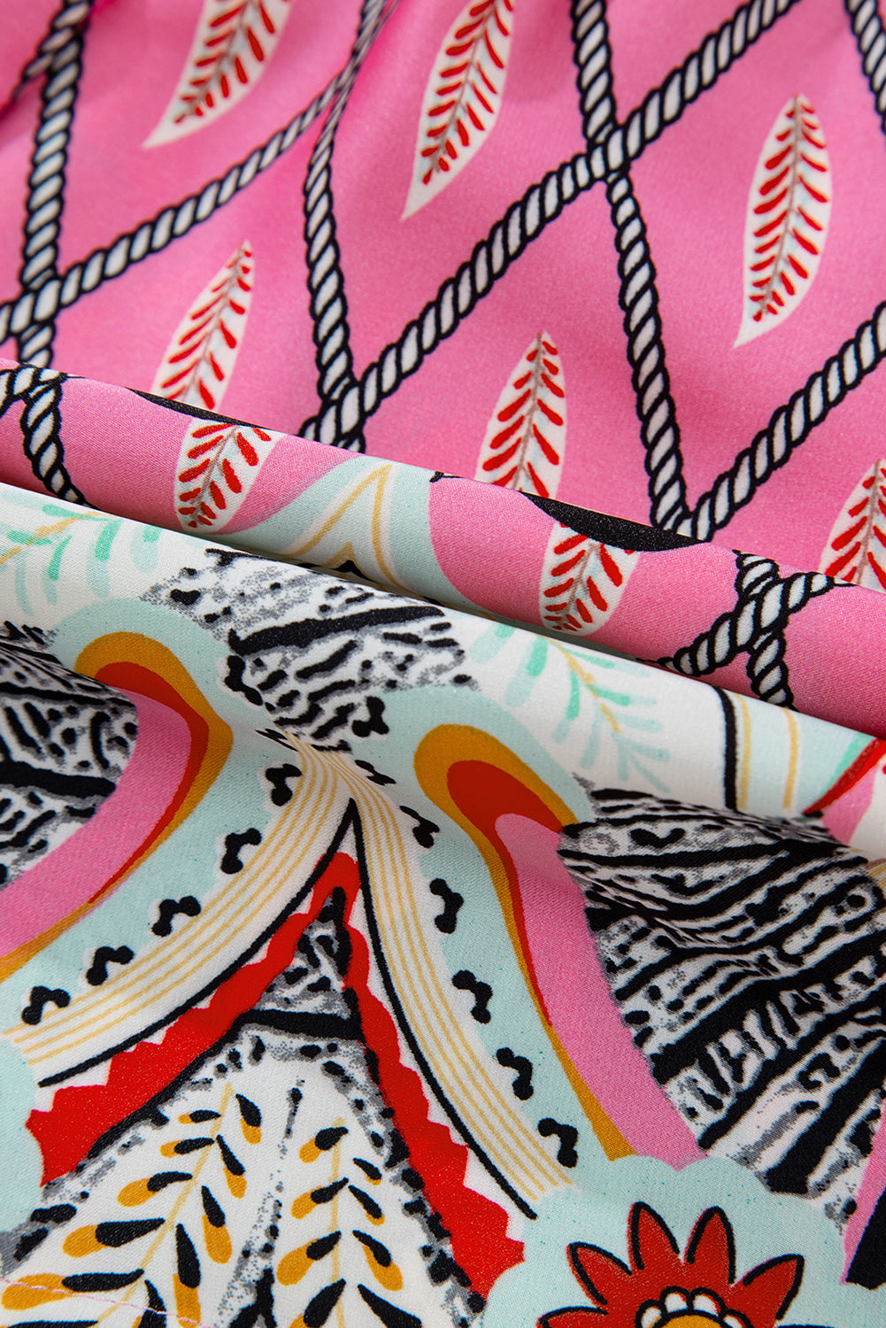 Combinaison taille haute à col en V et imprimé géométrique cachemire rose