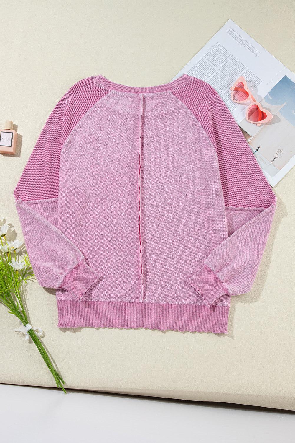 Sweat-shirt raglan rose en maille gaufrée avec coutures apparentes