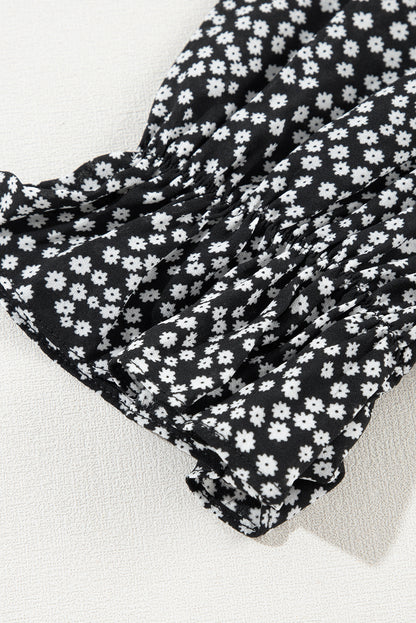 Robe mi-longue noire à imprimé floral et manches longues à col carré