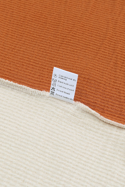 Top de manga larga acanalado con bloques de color patchwork