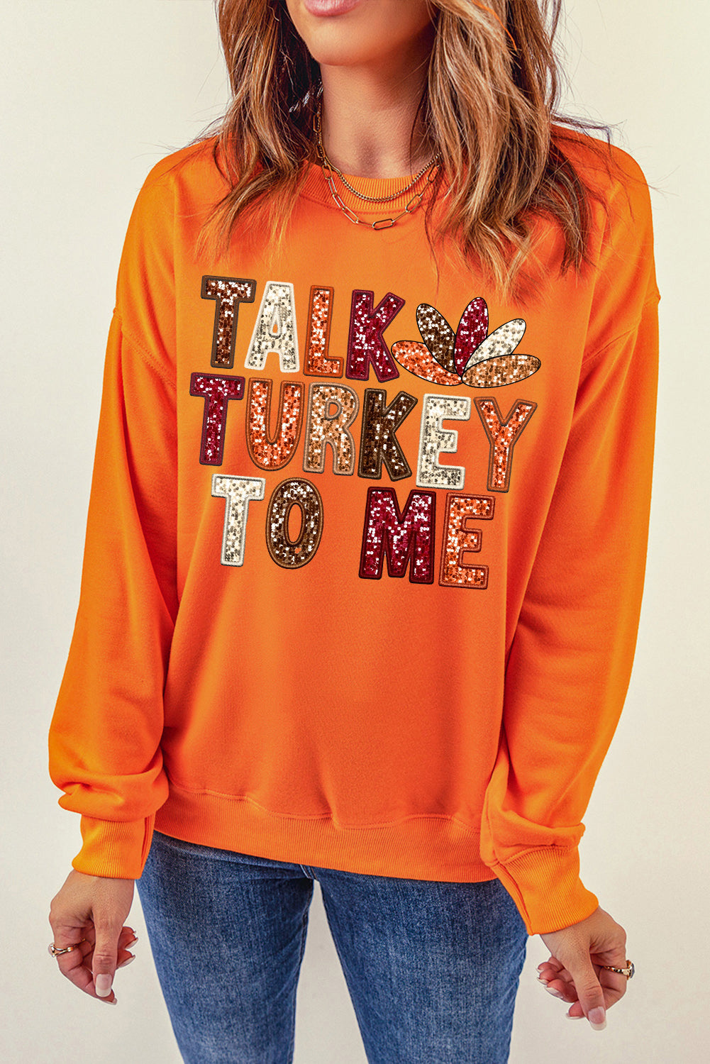 Sweat-shirt graphique orange « PARLEZ-MOI DE DINDE » pour les fêtes de Thanksgiving