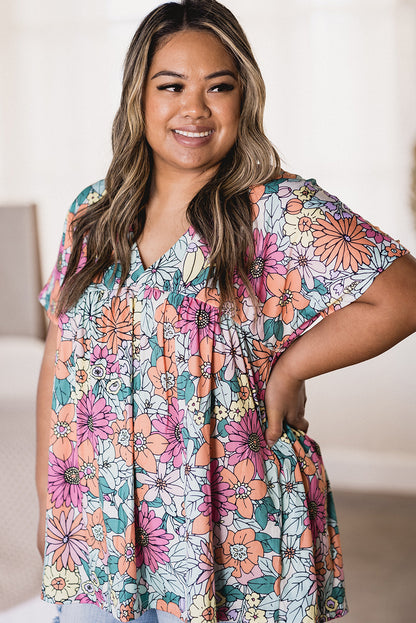 Top de manga corta con dobladillo asimétrico y estampado floral multicolor 