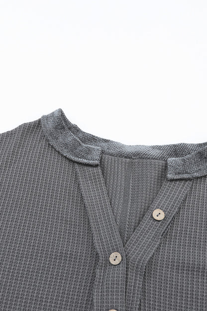 Haut Henley en tricot gaufré blanc brillant avec coutures apparentes et patchs contrastés