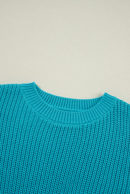 Pull turquoise à volants et manches bouffantes