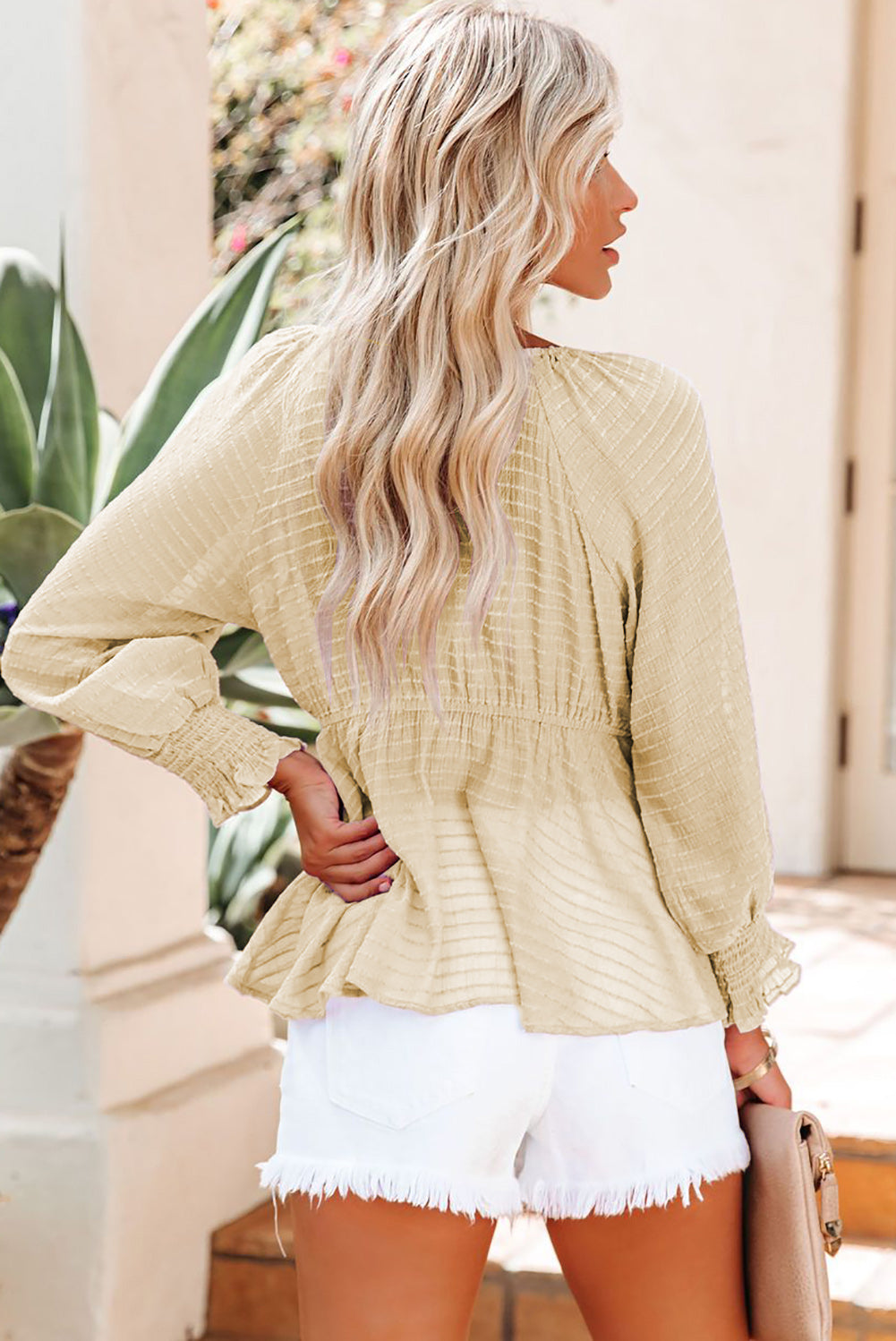 Chemisier péplum texturé noué sur le devant 