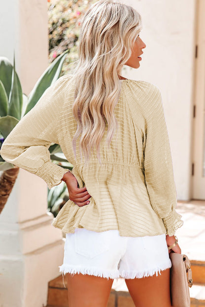 Chemisier péplum texturé noué sur le devant 