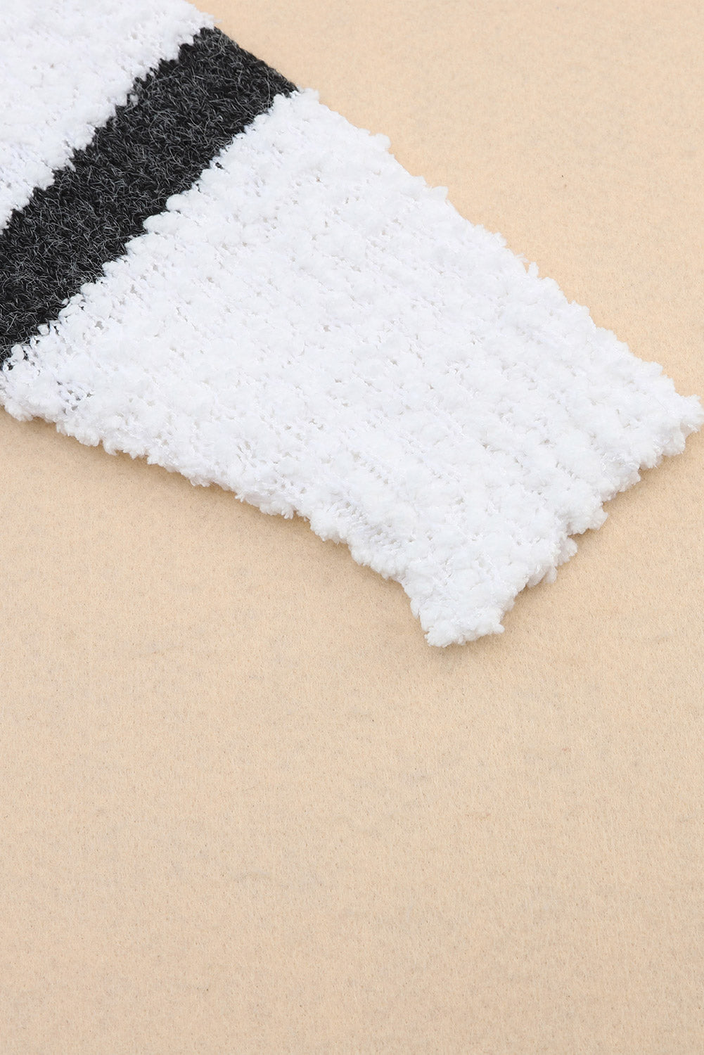 Pull rayé en maille popcorn 