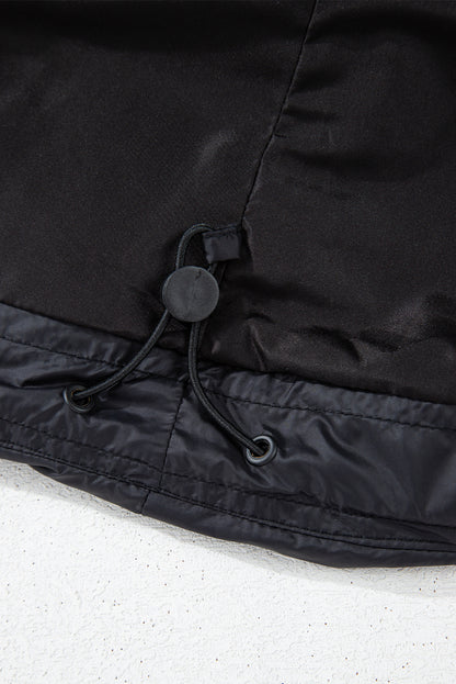 Veste matelassée noire à col montant et fermeture éclair