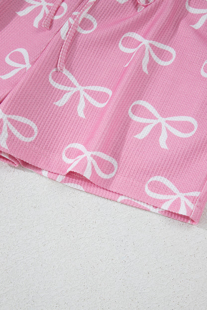 Ensemble t-shirt col V et short en tricot gaufré rose imprimé nœud papillon