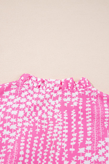 Chemisier rose à imprimé abstrait et bordure Ric Rac, manches flottantes, col en V cranté