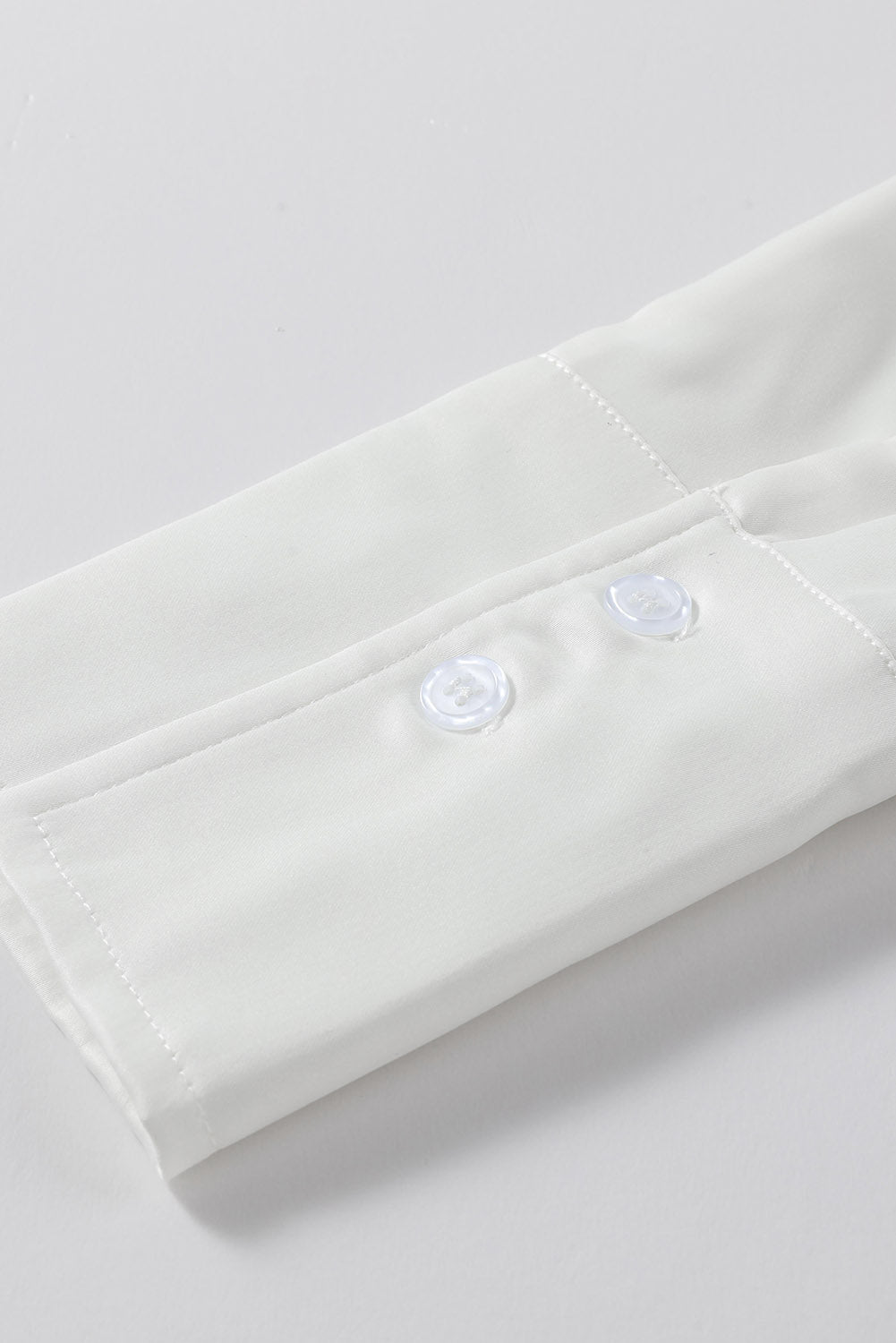 Blusa elegante de manga larga con cuello vuelto negro