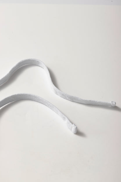 Mini-jupe en molleton gris clair avec cordon de serrage et poches